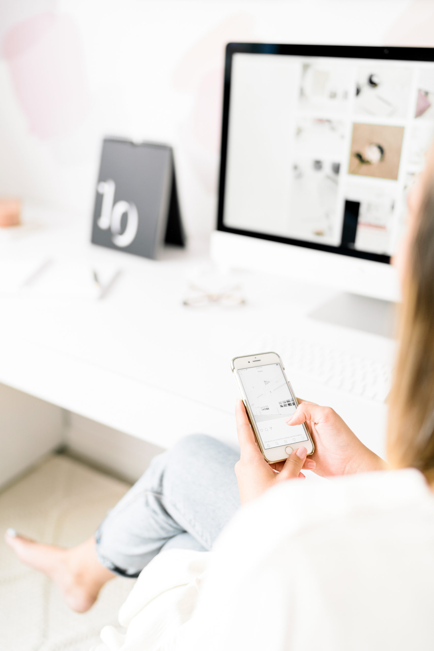 social media manager sitting at her desk working